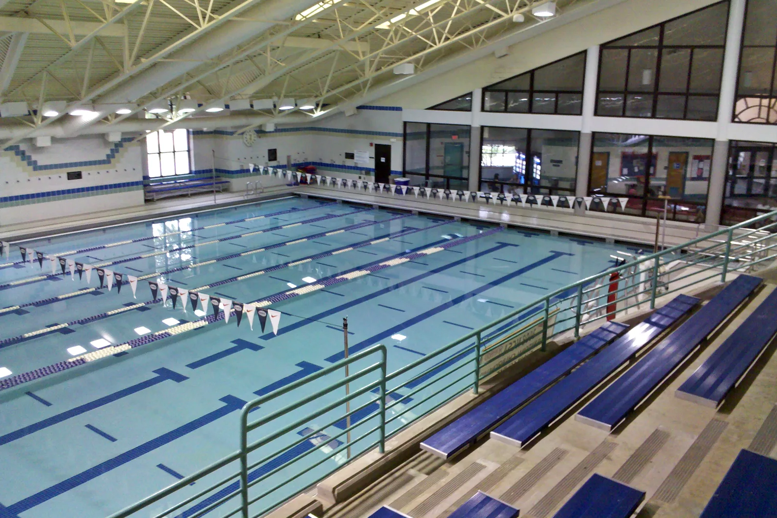 An indoor lap pool with spectator seating. The picture is not of the Germantown Athletic Club.