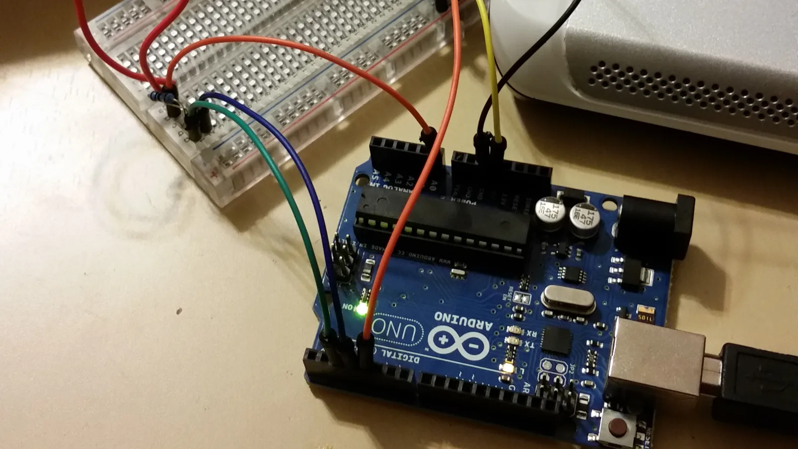 An Arduino board wired to a breadboard and sensors, the kind of hardware the first-place project used. The picture is not of the students' project.