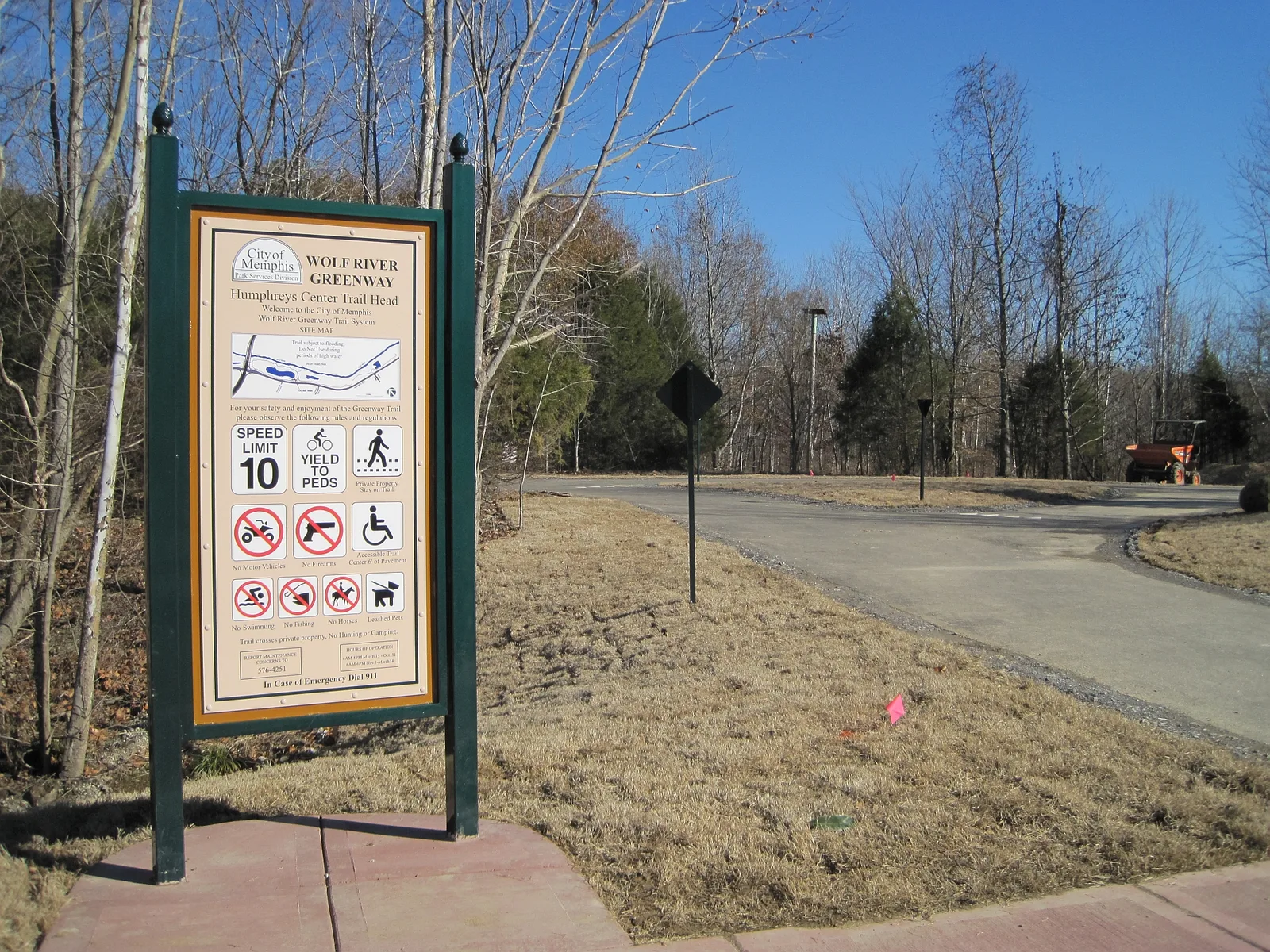 A Wolf River Greenway rules sign with a posted 10 mph speed limit, on the Memphis section of the trail. The picture is not in Germantown.
