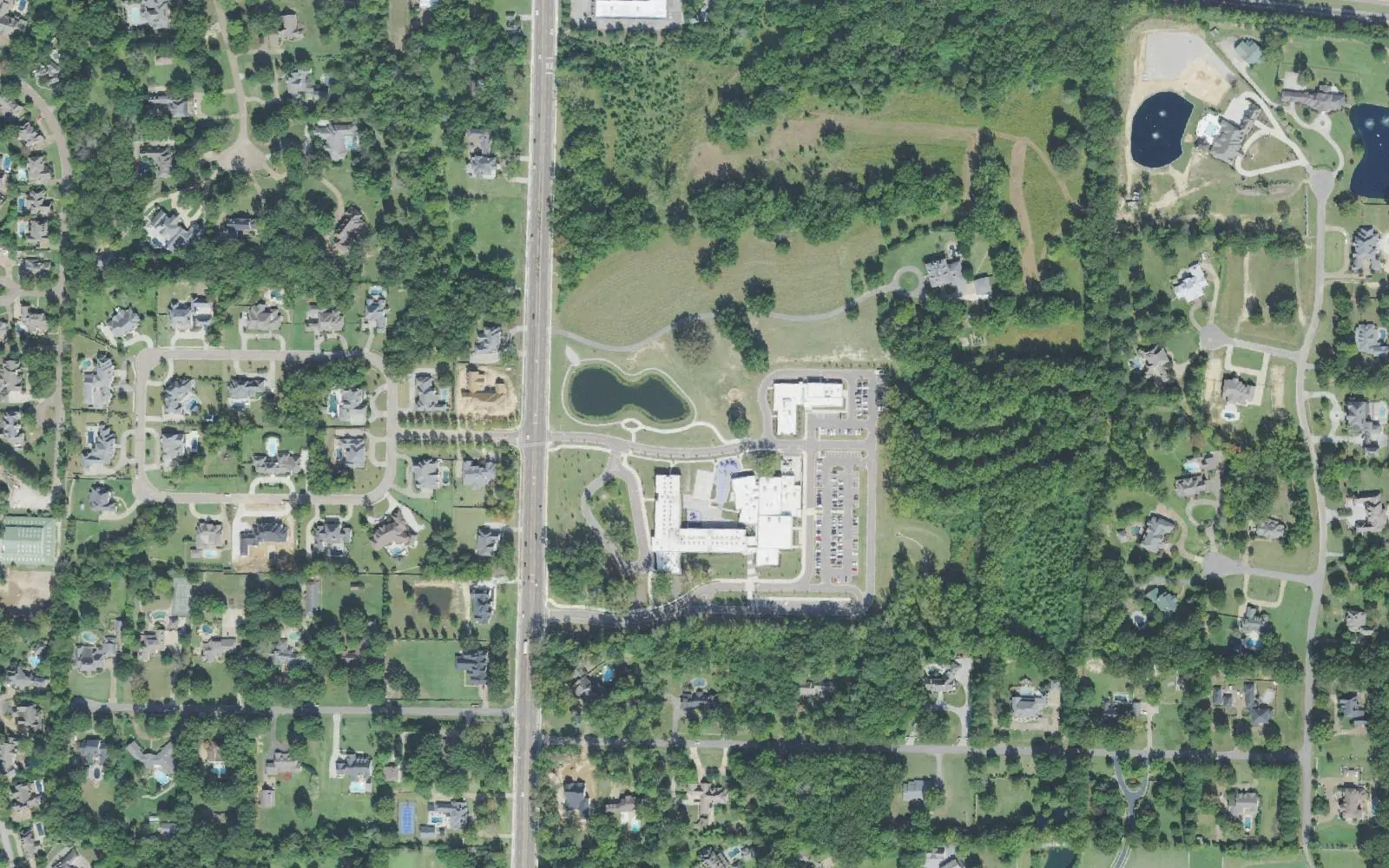 Forest Hill Elementary School, its pond and Forest Hill-Irene Road in southeast Germantown, seen from the air