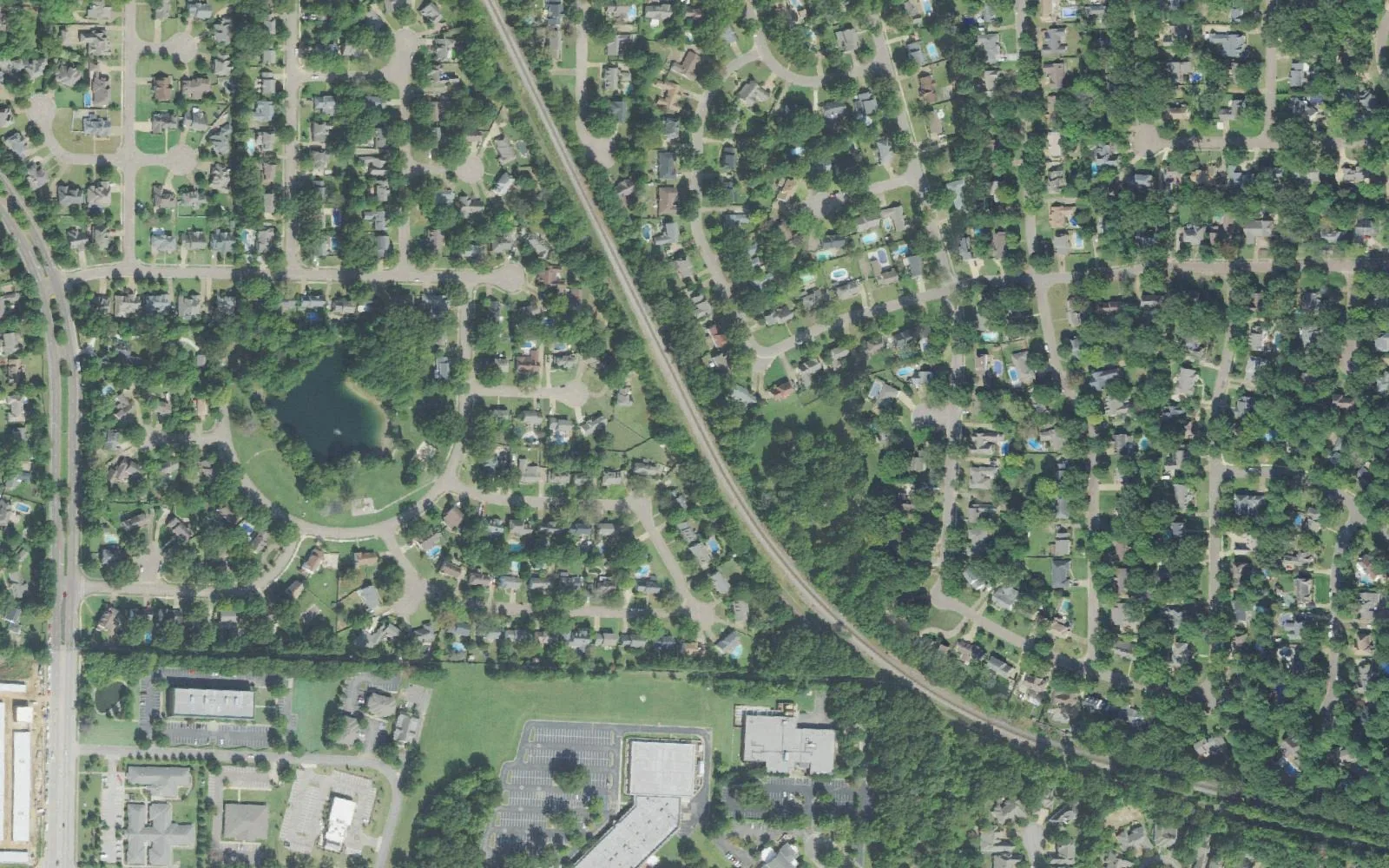 Houses on wooded streets in south Germantown around Germantown Station and Oakleigh, seen from the air